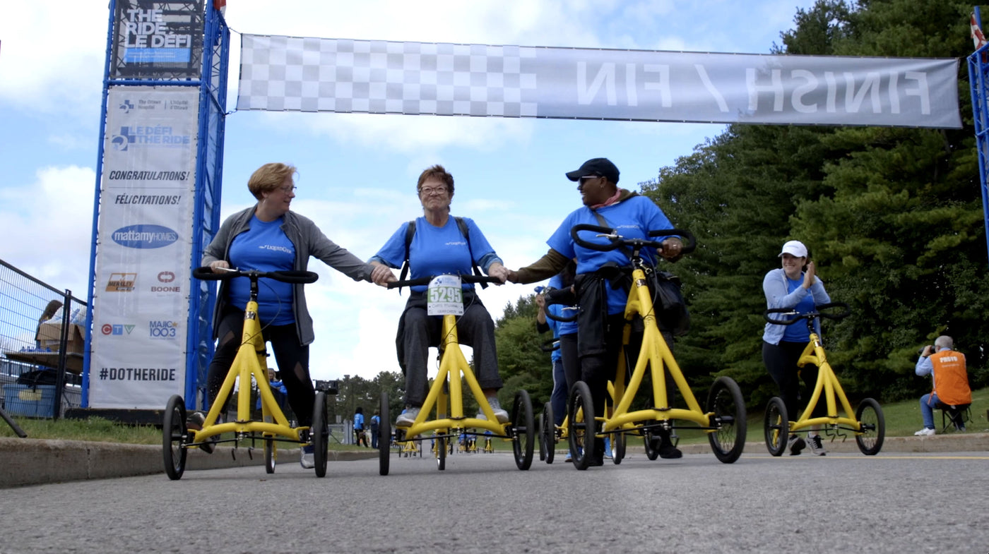 group of people riding alinkers in a race